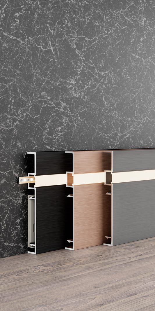 Surface-mounted aluminum LED skirting baseboard channel system, 3.3 ft, in black, copper, and gray finishes.