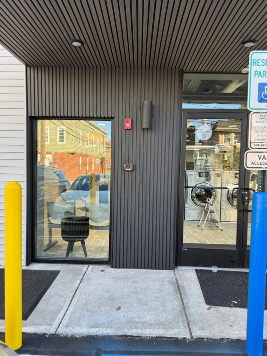 Black composite wide boards along laundry side path