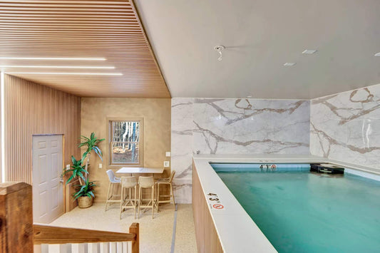 Luxury spa wall design with acoustic wood panels and PVC marble sheets