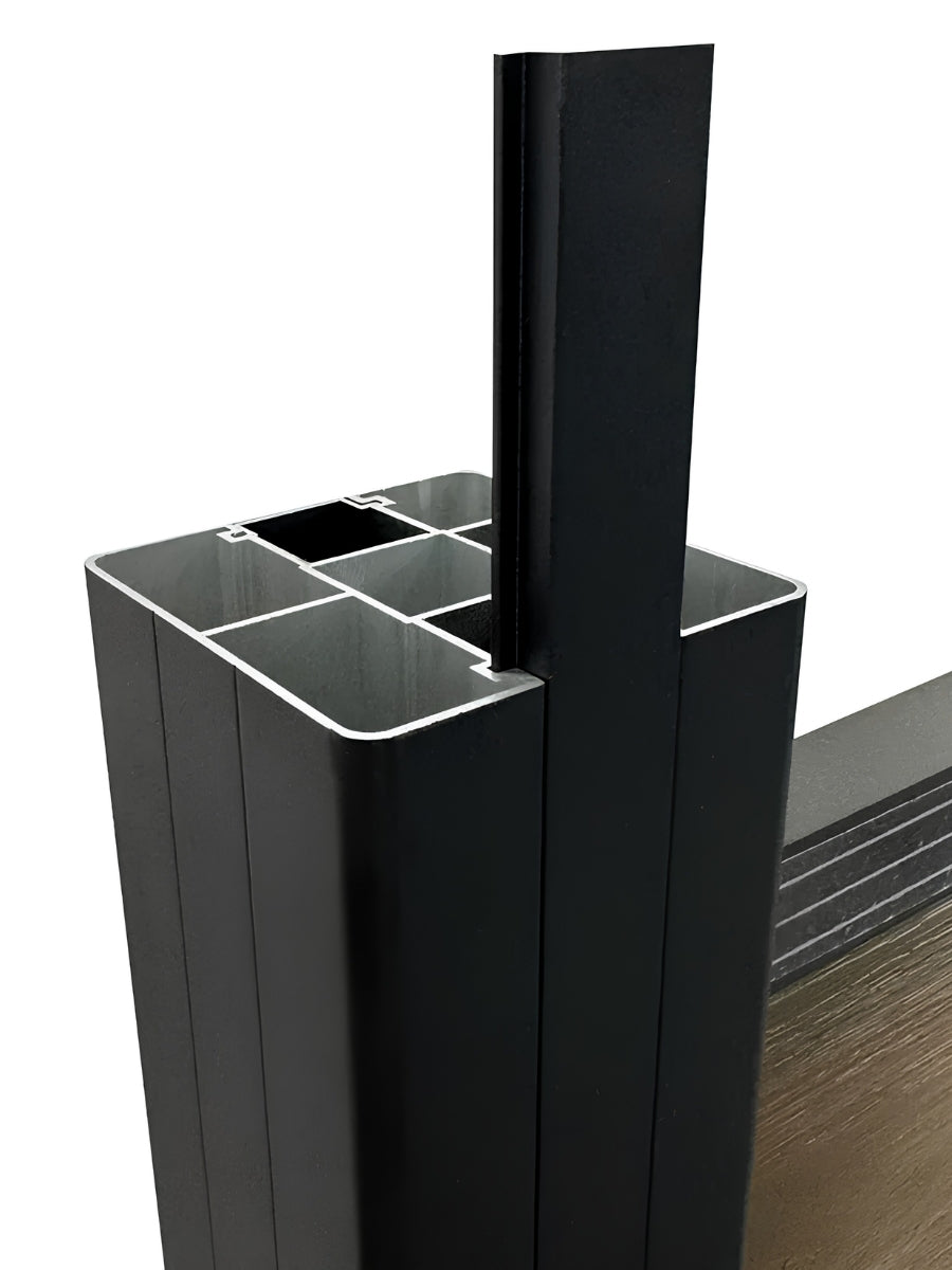 Close-up of the black in-ground fence post profile fitted around horizontal fence rails