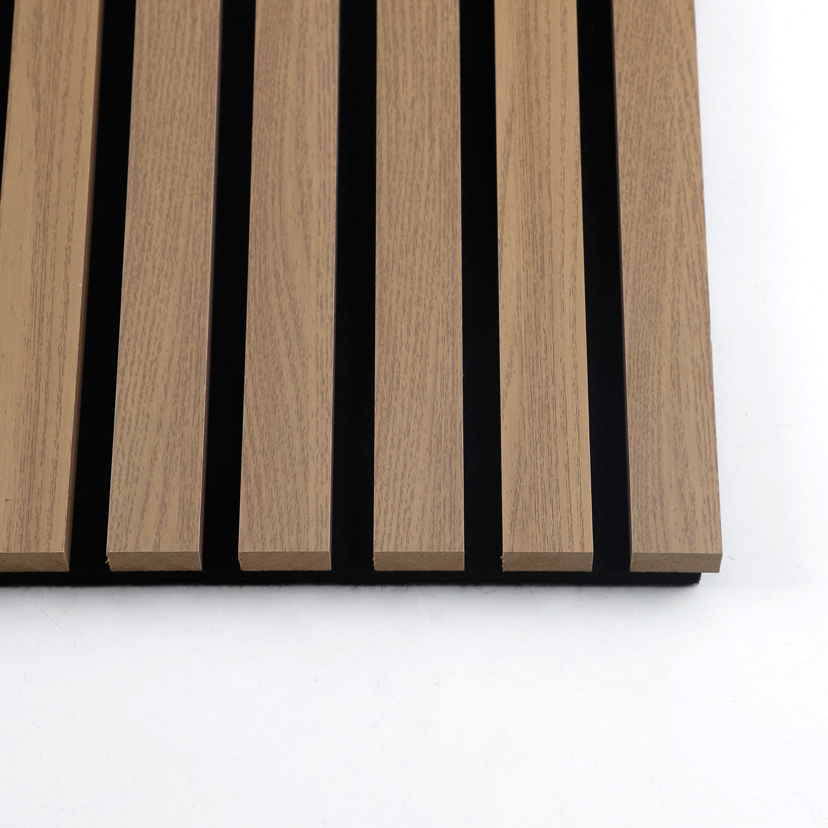 Top view of the Royal Oak acoustic wall panel edge, slat spacing, and black backing