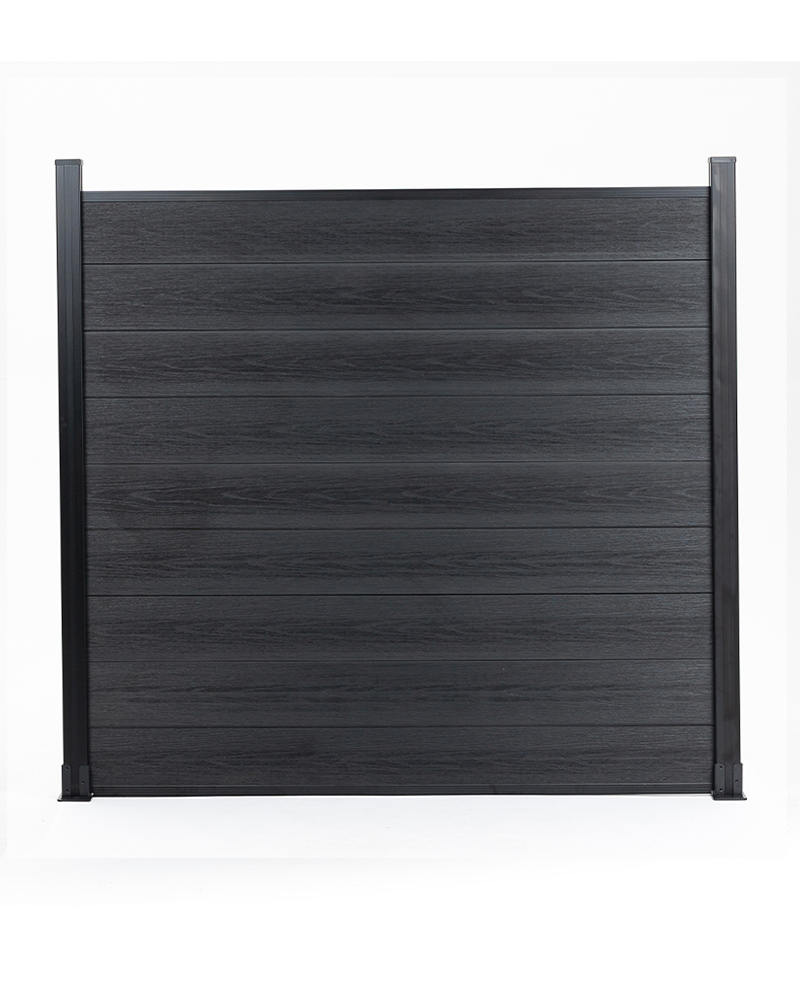 Black composite fence with wood grain texture co-extrusion, supported by dark metal posts - durable, stylish in New Jersey