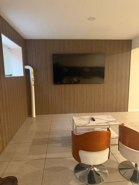 Decorative acoustic wall panels with vertical fluted design