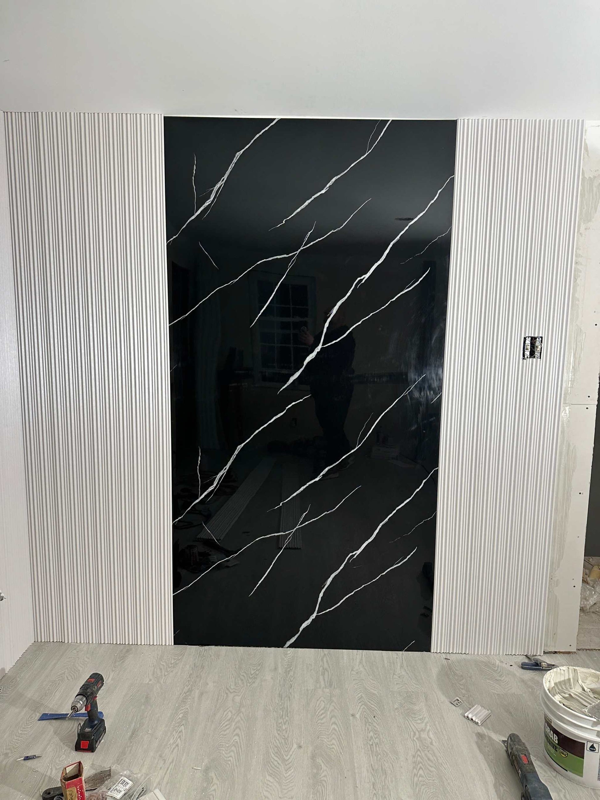 Deep black marble PVC wall panel with white veins, 4x8 ft, UV-protected, fireproof, waterproof, ideal for NJ homes &