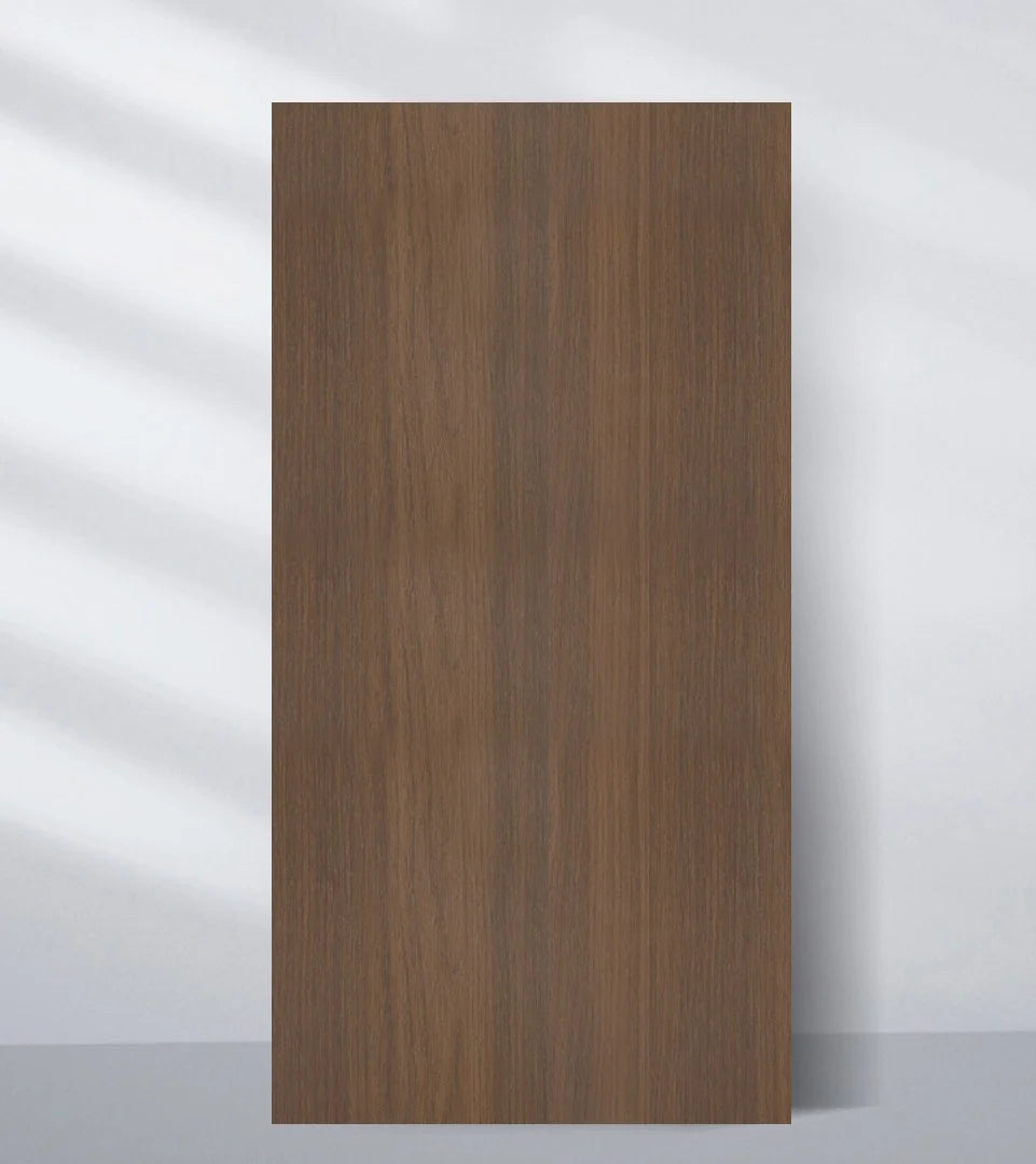 Brown wood veneer wall panel sample with fine vertical grain