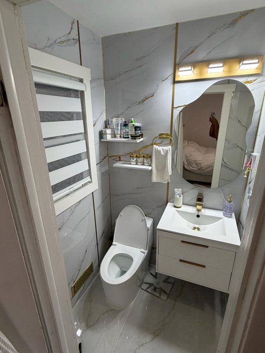 PVC marble sheet bathroom wall design with backlit mirror and vanity