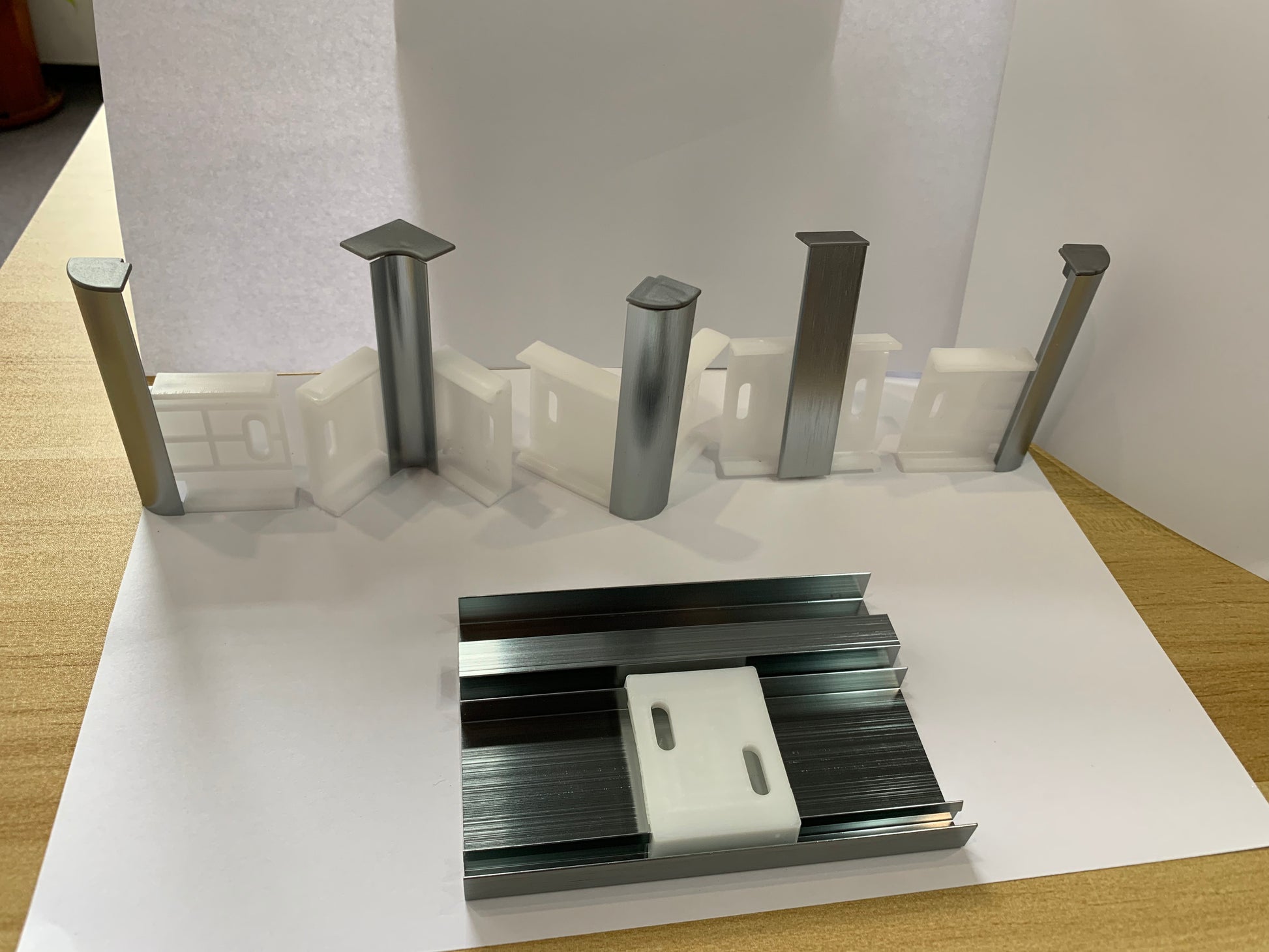 Aluminum LED skirting baseboard channel system: surface-mounted profiles, end caps, mounting brackets.