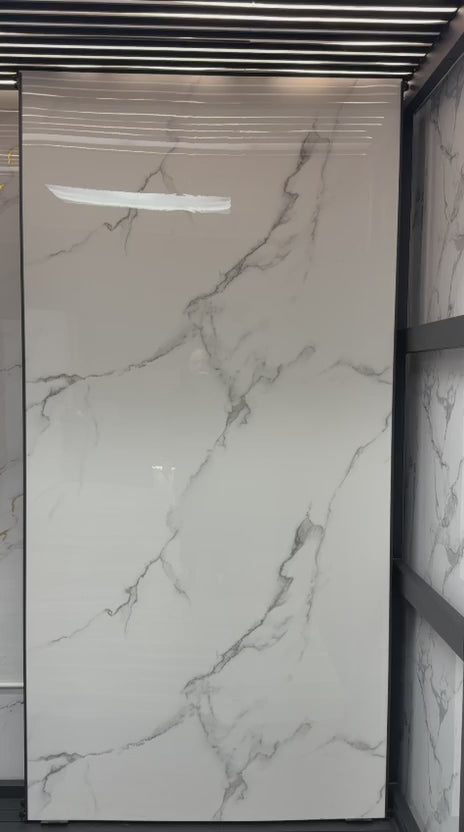 Calacatta White marble PVC wall panel installed on luxury interior wall, UV protected waterproof 4x8 ft