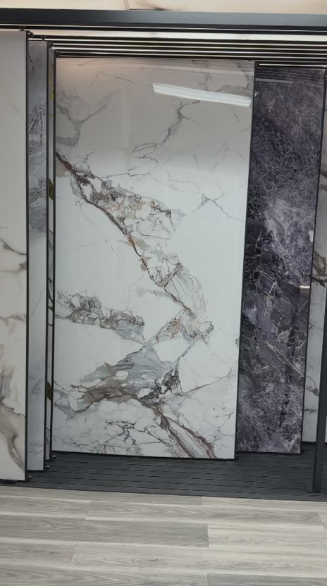 Gray and beige veined white PVC marble sheets with continuous pattern installed on modern interior wall, waterproof 4x8 ft